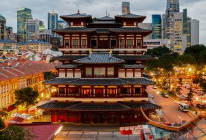 The Buddha Tooth Relic Temple in Singapore's Chinatown at sunset