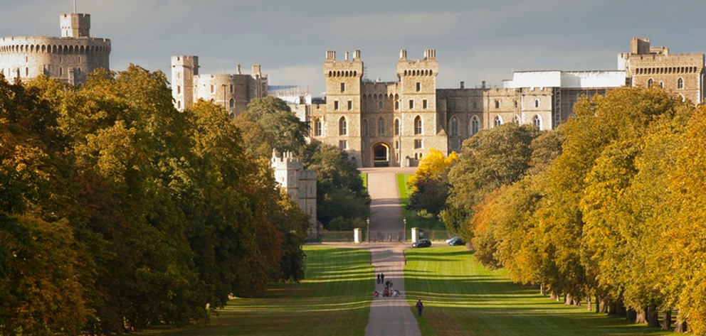 Windsor Castle long walk with people and autum trees each side