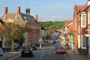 Henley on thames with flags across street cars